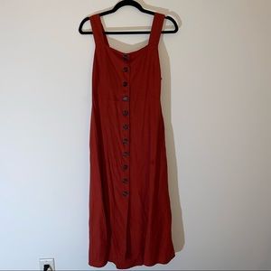 Orange summer dress with brown buttons and bow in back